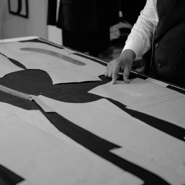 Basted jacket first fitting for custom suit in Hoi An at Maya Tailor